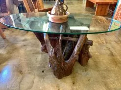 The Phillips Forest Store Glass Coffee Table With A Natural Redwood Base