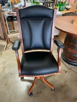 The Phillips Forest Products Forest Store OAK ROLLING CHAIR WITH BLACK LEATHER